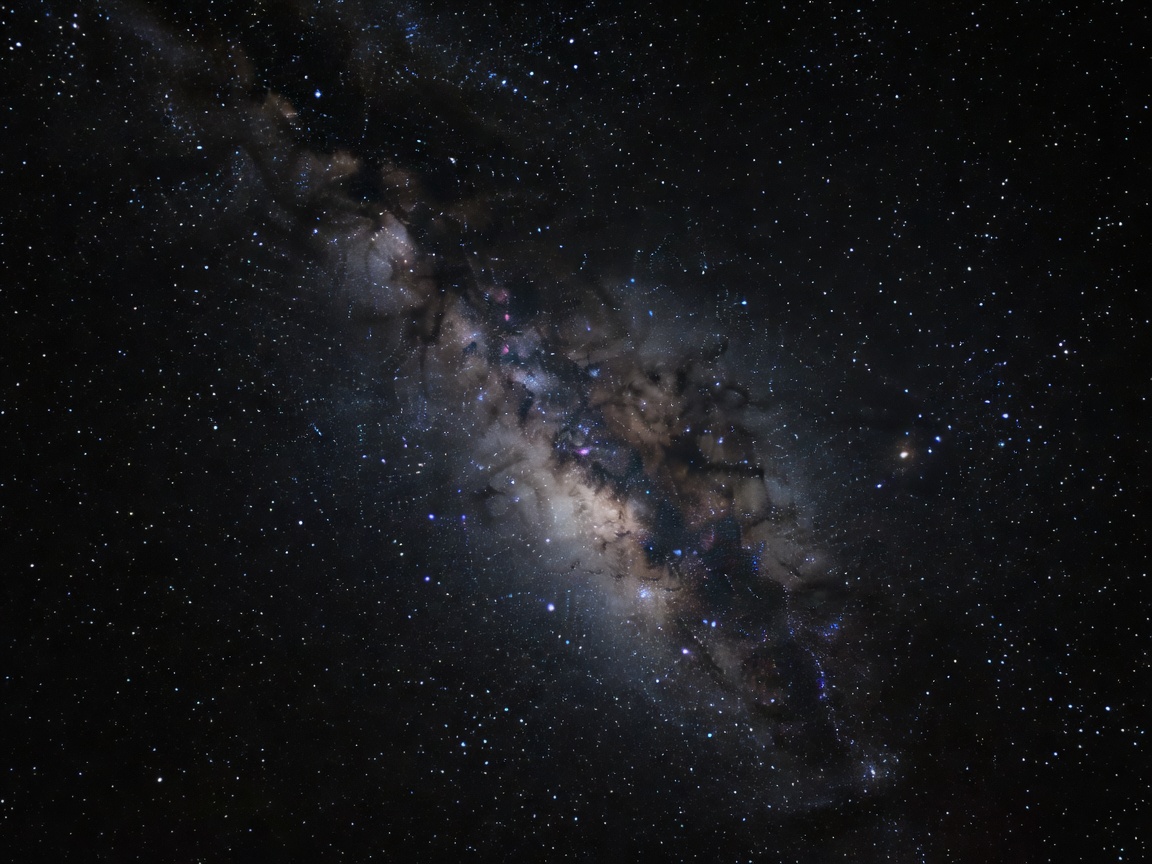 Tähtitaivas ja galaksi, joka kuvastaa Outer Wilds -pelin avaruusteemaa